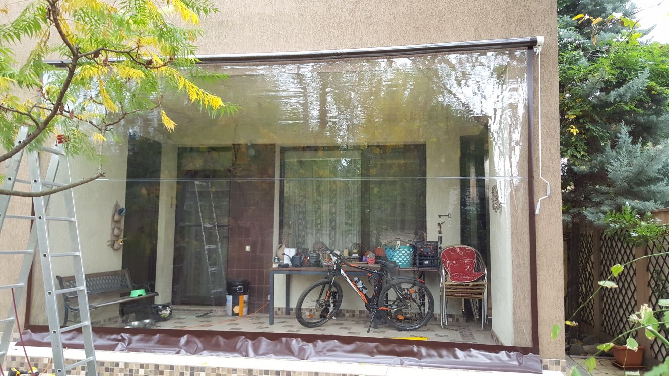 Rulou transparent cu manivela